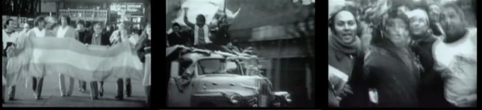 Personas marchan en una protesta con una bandera grande, un grupo celebra sobre un automóvil y varias personas sonríen y posan juntas en un ambiente urbano.

Description generated by AI